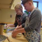 HMS students bake bread for learning, caring