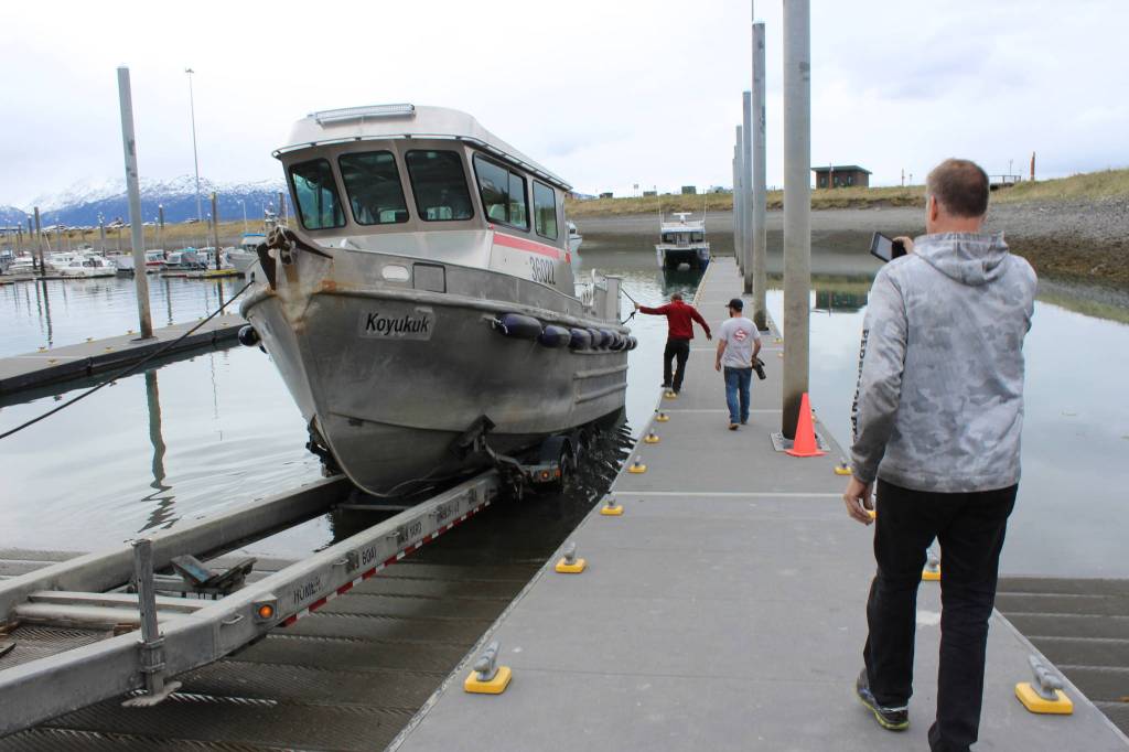 Homer’s marine trades give burned boat new life