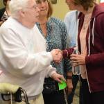Sen. Lisa Murkowski, R-Alaska, right, visits with retired nurse Mary Raymond, left, as Mary Fries, center, also a nurse, listens. Murkowski spoke at town hall meeting on health care Friday, July 7, 2017, at Homer City Hall. About 150 people packed the Cowles Council Chambers to share their concerns about health care.