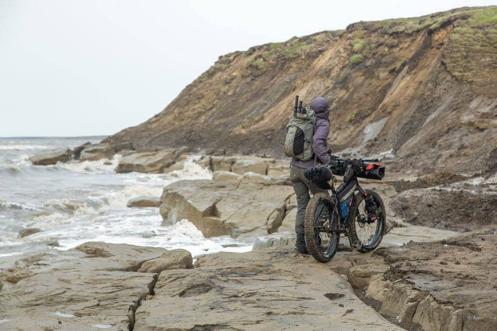 Kim McNett looks at a stretch of beach that has run out. (Photo courtesy Bjørn Olson)
