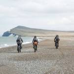 The group heads north on a firm beach &mdash; perfect riding conditions for fat bikes. (Photo courtesy Bjørn Olson)