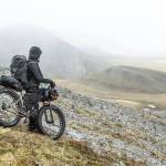 Daniel Countiss pauses before heading down a hill. (Photo courtesy Bjørn Olson)