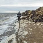 Some sections of beach were so narrow the fat bikers had to skirt the surf and sea foam. (Photo courtesy Bjørn Olson)