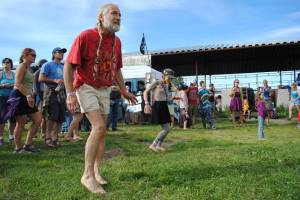 Stu Schmutzler dances at the River Stage during Rabbit Creek Ramblers&rsquo; set at the 2017 Salmonfest in Ninilchik, Alaska on Friday, August 4, 2017. (Photo by Kat Sorensen/Peninsula Clarion)