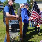 Darrel Oliver holds a mirror at a protest against the events of Charlottesville, Va., and other white supremacist rallies. He joined about 50 people who stood up against racism at WKFL Park in Homer from 3-4 p.m. Sunday, Aug. 13, 2017 in Homer, Alaska. Oliver&rsquo;s mother, Mary Eunice Oliver, was active in the civil rights movement, and as a boy OIliver shook the hand of Martine Luther King Jr. He said he held the mirror because &ldquo;We need to look at ourselves. What are we doing to make it better? How has it gotten to where it is. For Pete&rsquo;s sake, this is horrible,&rdquo; he said. &ldquo;My brother was shot at by the KKK in Selma in 1964. Why are we still doing this?&rdquo; (Photo by Michael Armstrong, Homer News)