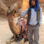 A Bedouin poses with his camel in 2015 in Petra, Jordan. (Photo courtesy Christina Whiting)