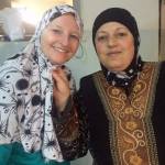 Christina Whiting and a woman named Noor try on hijabs in 2015 in Jordan. (Photo courtesy Christina Whiting)