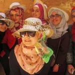 Women pose in scarves in 2015 in Petra, Jordan. (Photo courtesy Christina Whiting)