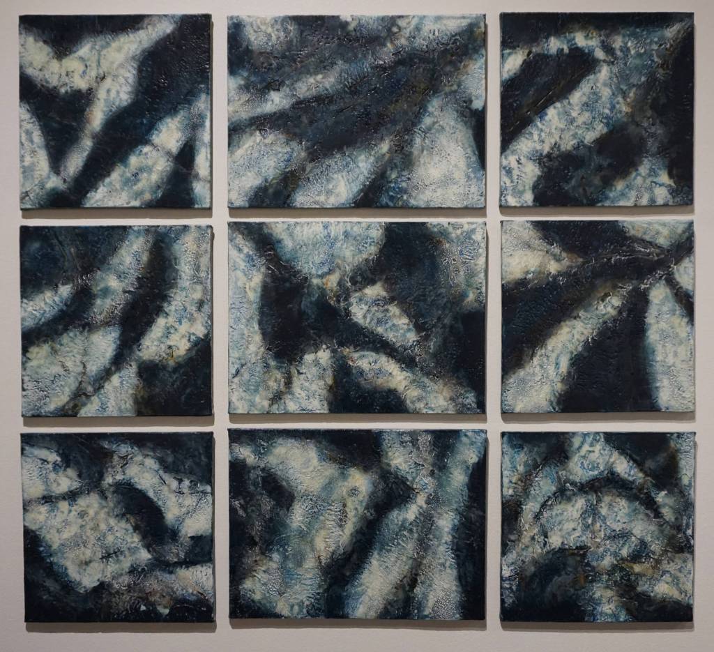 Kathy Smith&rsquo;s encaustic painting, &ldquo;Ice Maps,&rdquo; depicts disintegrating ice fields Tuesday, Aug. 22, 2017. It&rsquo;s part of the Pratt Museum&rsquo;s &ldquo;cARTography&rdquo; exhibit. (Photo by Michael Armstrong, Homer News)