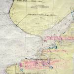 This 1944 map photographed Tuesday, Aug. 22, 2017 from the Pratt Museum exhibit cARTography includes notations showing areas open to fish traps (the areas with the blue lines) as well as locations of Kachemak Bay and Cook Inlet canneries. (Photo by Michael Armstrong, Homer News)