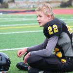 Sophomore Antonin Murachev takes a breather during half time at the Cougar football team&rsquo;s game against Nikiski High School on Saturday, Sept. 2, 2017 in Homer, Alaska. The Cougars lost 18-40 in their second game of the season. Their first scheduled game was forfeited due to not having enough players at that point in the season. (Photo by Megan Pacer/Homer News)