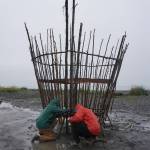 Robin Austin, left, and Natalia Mulawa, right, work on Shine, this year&rsquo;s Burning Basket, Tuesday, Sept. 5, 2017 at Mariner Park on the Homer Spit, Alaska. The annual interactive art project will be offered to the community on Sunday and then transformed into heat and light at sunset. (Photo by Michael Armstrong, Homer News)