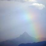 A rainbow appears over Kachemak Bay and Poot Peak on Monday, Sept. 4, 2017 in Homer, Alaska. (Photo by Michael Armstrong/Homer News)