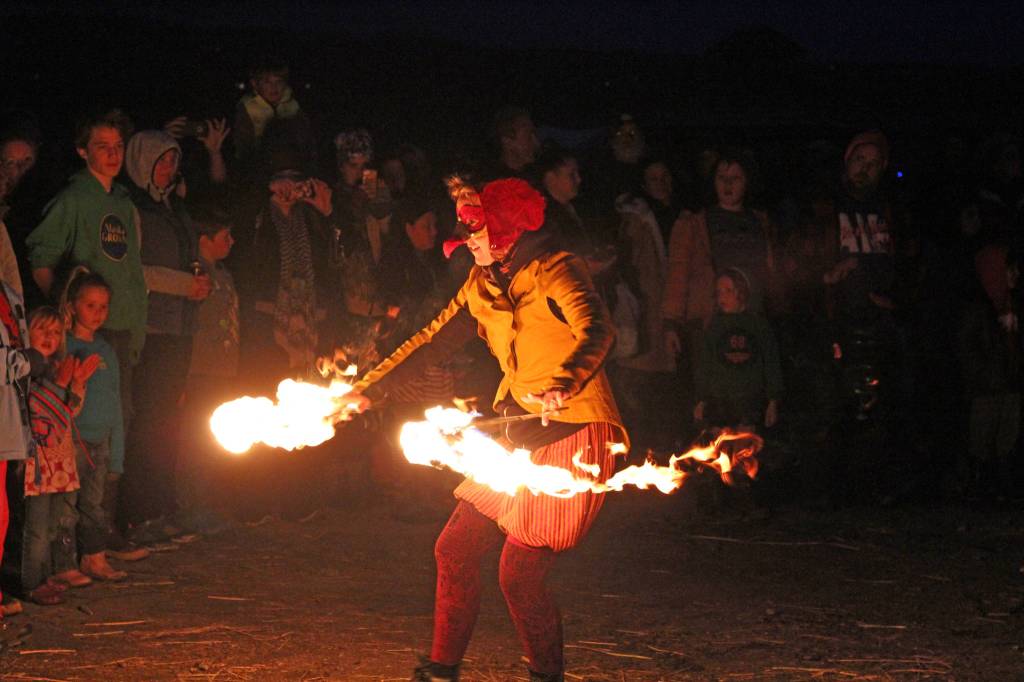 A fire dancer performs for the crowd gathered at this year&rsquo;s celebration for the Burning Basket Project on Sunday, Sept. 10, 2017 at Mariner Park in Homer, Alaska. After the basket built over the course of a week by community volunteers was burned, dancers treated onlookers to a fire show. (Photo by Megan Pacer/Homer News)