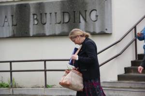 Former Alaska Dispatch News owner Alice Rogoff leaves federal bankruptcy court in Anchorage Sept. 11 after a judge approved the sale of the the company to the Binkley Co. for $1 million. Left unresolved is the fate for nearly 200 creditors still owed $2.3 million in unpaid bills incurred by the ADN under Rogoff&rsquo;s ownership. (Photo/Naomi Klouda/AJOC)