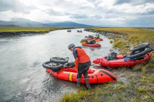 Lael Wilcox prepares to launch her loaded packraft into the Fox River. (Photo by Bjørn Olson)