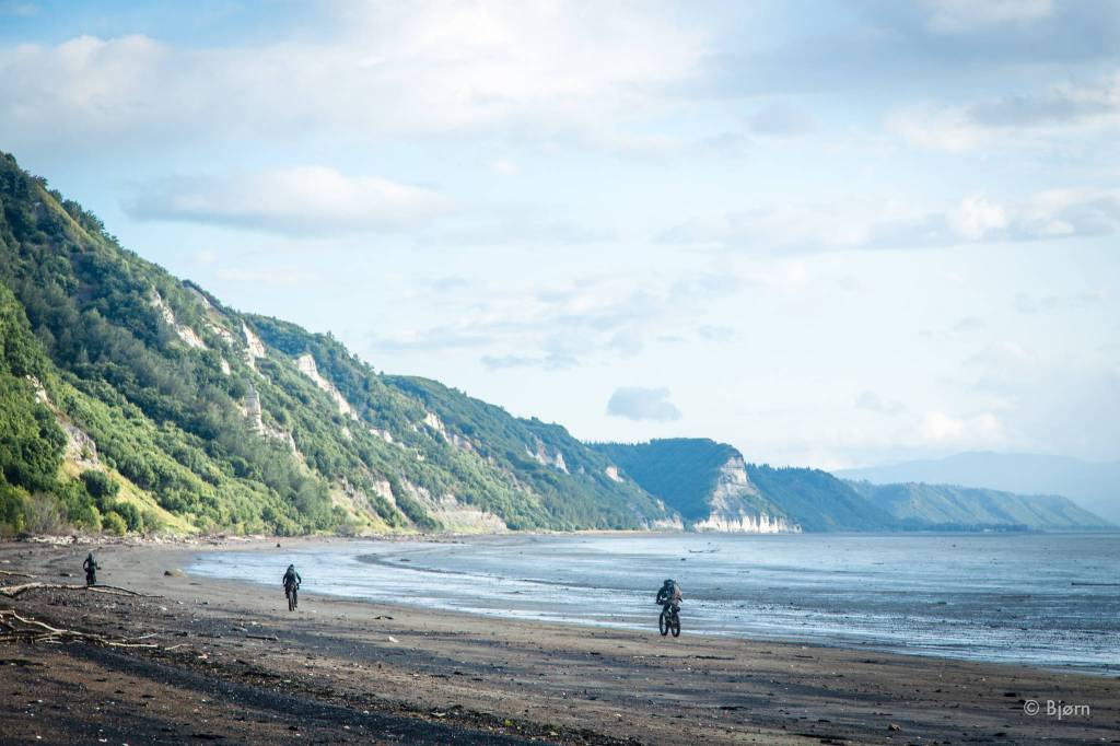 Daniel Countiss, Jessi Dullinger, and Kim McNett ride their fat-bikes on the beach east of Homer. (Photo by Bjørn Olson)