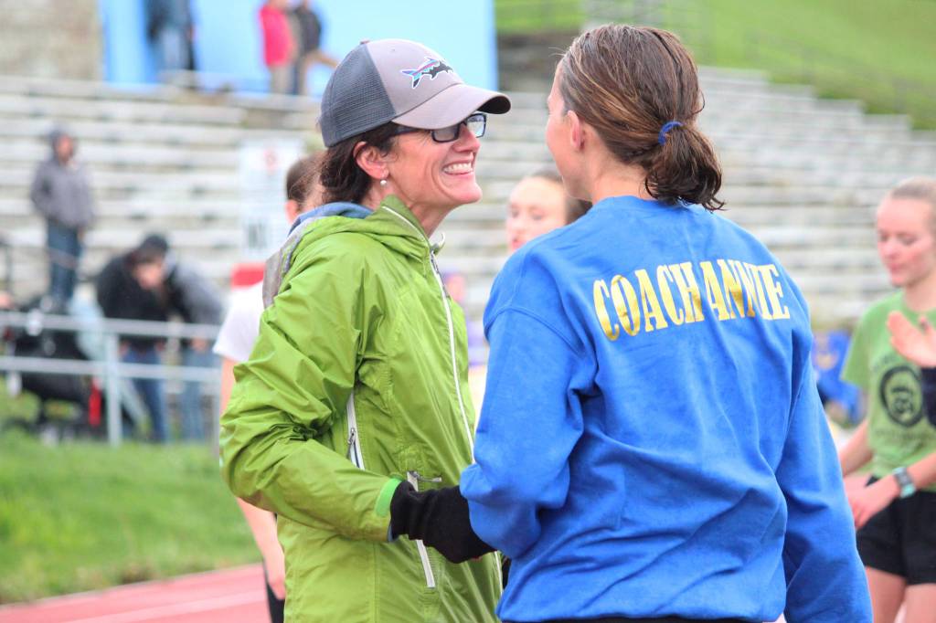 Saundra Hudson, an active member of and advocator for the Homer running community and teacher at Homer High School, talks with Cross-Country Coach Annie Ridgley after completing the Mariner Mile, a new event held Thursday, Sept. 14, 2017 at the high school track in Homer, Alaska. Hudson, who was a heavy advocator for the school&rsquo;s track to be put in, experienced a head injury when she slipped on the ice running this past March, and Thursday&rsquo;s fundraising event for the Kachemak Bay Running Club was the first time she&rsquo;s run in six months. (Photo by Megan Pacer/Homer News)