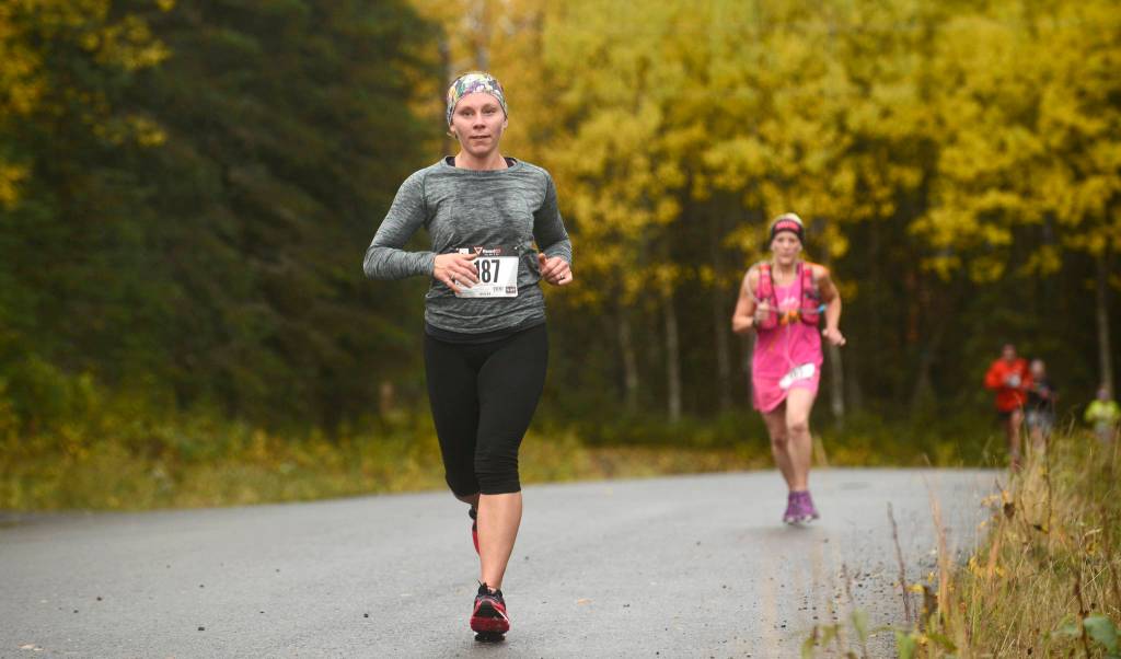 Sondra Stonecipher runs in the Kenai River half-marathon on Sunday, Sept. 24, 2017 near Kenai, Alaska. (Photo by Ben Boettger/Peninsula Clarion)