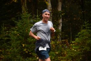 Victor Samoei runs in the Kenai River half-marathon on Sunday, Sept. 24, 2017 near Kenai, Alaska. (Photo by Ben Boettger/Peninsula Clarion)