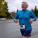 Runner Jen Novobilski pushes toward mile 11 of the Kenai River half-marathon on Sunday, Sept. 24, 2017 alongside the Kenai Spur Highway in Kenai, Alaska. (Photo by Ben Boettger/Peninsula Clarion)