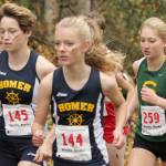Homer&rsquo;s Alex Moseley and Brooke Miller and Seward&rsquo;s Ruby Lindquist jockey for position in the Division II girls race at the Region III Championships on Saturday, Sept. 23, 2017, at the Government Peak Recreation Area. (Photo by Jeremiah Bartz/Frontiersman)