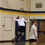 Freshman Laura Inama, a swinger who was pulled up from the Homer Mariner junior varsity volleyball team to play with varsity, serves the ball during the team&rsquo;s home game against Seward High School on Friday, Sept. 29, 2017 in Homer, Alaska. The Mariners fell to the Seahawks, winning one set to Seward&rsquo;s three. (Photo by Megan Pacer/Homer News)
