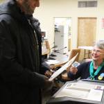 Homer resident Scott Owens casts his vote during the municipal election Tuesday, Oct. 3, 3017 at Homer City Hall in Homer, Alaska. (Photo by Megan Pacer/Homer News)