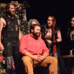 Curtis Jackson, left, as Judas, Kyle Schneider, center, as Jesus, Hannah Heimbuch, right, as Mary Magdalene, and Sally Oberstein, far right, as an apostle, rehearse a scene from &ldquo;Jesus Christ Superstar&rdquo; on Monday, Oct. 2, 2017 at the Mariner Theatre in Homer, Alaska. The musical opens Friday, Oct. 6. (Photo by Michael Armstrong, Homer News)
