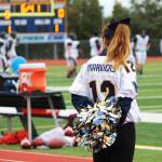 A Homer High School cheerleader watches the Mariners&rsquo; game against Ben Eielson High School on Saturday, Oct. 7, 2017 in Homer, Alaska. The Mariners defeated the Ravens 33-21, and will head to the ASAA First National Bowl Series Division III Championship. (Photo by Megan Pacer/Homer News)