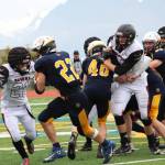 Homer sophomore Noah Fisk runs the ball during Homer&rsquo;s football game against Ben Eielson High School on Saturday, Oct. 7, 2017 in Homer, Alaska. The Mariners beat the Ravens 33-21 and will head to the ASAA First National Bowl Series Division III Championship. (Photo by Megan Pacer/Homer News)