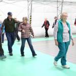 Dr. Rob Downey, functional medicine provider and chief of staff at South Peninsula Hospital (far left) talks with community members during the first ever Walk with a Doc event Saturday, Oct. 7, 2017 at the newly completed South Peninsula Athletic and Recreation Center in Homer, Alaska. The walks are part of a national program and will take place monthly with rotating doctors to help people get exercise and health advice at the same time. (Photo by Megan Pacer/Homer News)