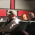 Homer residents watch with rapt attention the varsity football team&rsquo;s state championship game against Barrow High School on Saturday, Oct. 14, 2017 at the Homer Theatre, where it was livestreamed for those who weren&rsquo;t able to travel to the game&rsquo;s location in Barrow. The Mariners fell short at the ASAA First National Bowl Series Division III Football State Championship game, 20-14. (Photo by Megan Pacer/Homer News)