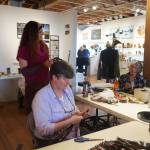 Kayla Spaan, left, and Megan O&rsquo;Neill, right, work on Wearable Arts pieces Saturday, Oct. 14, 2017 at a workshop with Sheila Wyne at the Bunnell Street Arts Center in Homer, Alaska. Wyne is artist in residence at Bunnell for a residency sponsored by the Homer Fiber Arts Collective. (Photo by Michael Armstrong)