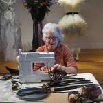 Lynn Burt sews pieces of 16mm film for a Wearable Arts piece Saturday, Oct. 14, 2017 at a workshop with Sheila Wyne at the Bunnell Street Arts Center in Homer, Alaska. Wyne is artist in residence at Bunnell for a residency sponsored by the Homer Fiber Arts Collective. (Photo by Michael Armstrong)