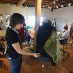 Mallory Drover works on a Wearable Arts piece Saturday, Oct. 14, 2017 at a workshop with Sheila Wyne at the Bunnell Street Arts Center in Homer, Alaska. Wyne is artist in residence at Bunnell. The residecy is sponsored by the Homer Fiber Arts Collective. Drover is a Homer student and a visual arts major attending Antioch College, Yellow Springs, Ohio. She took Wyne&rsquo;s workshop as part of work study at Antioch. (Photo by Michael Armstrong)