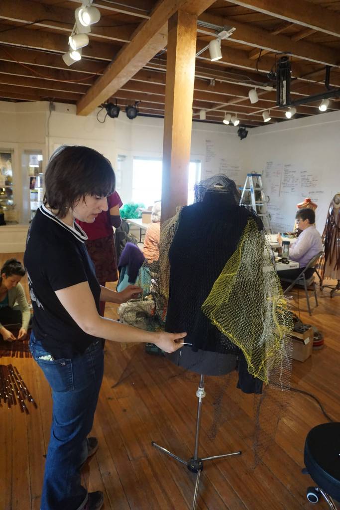 Mallory Drover works on a Wearable Arts piece Saturday, Oct. 14, 2017 at a workshop with Sheila Wyne at the Bunnell Street Arts Center in Homer, Alaska. Wyne is artist in residence at Bunnell. The residecy is sponsored by the Homer Fiber Arts Collective. Drover is a Homer student and a visual arts major attending Antioch College, Yellow Springs, Ohio. She took Wyne&rsquo;s workshop as part of work study at Antioch. (Photo by Michael Armstrong)
