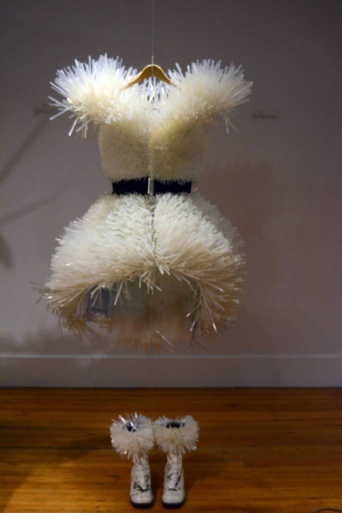 Sheila Wyne&rsquo;s &ldquo;Polar Wear,&rdquo; a dress made out of 1,000 plastic straws, shown here Friday, Oct. 6, 2017 at the Bunnell Street Arts Center in Homer, Alaska. The straws reference the hollow hairs of a polar bear. (Photo by Michael Armstrong)