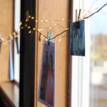 Photos and notes of thanks about Mary Lou Kelsey, a longtime certified nurse midwife in Himer, decorate the windows during a retirement party for her Friday, Oct. 13, 2017 at the Best Western in Homer, Alaska. (Photo by Megan Pacer/Homer News)