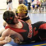 Kenai&rsquo;s Seth Kruse struggles to get free from Homer&rsquo;s Levi King during the Saturday, Oct. 21, 2017 Round Robin Rumble Tournament at Homer High School in Homer, Alaska. (Photo by Megan Pacer/Homer News)