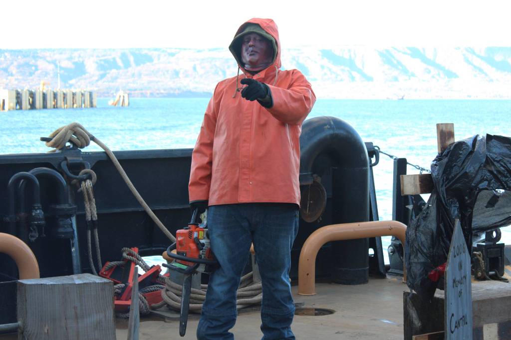Luis "Gonzo" Gonzalez intimidates a passerby as they near the end of their creepy tour of the U.S. Coast Guard Cutter Hickory during this year&rsquo;s Haunted Hickory event Thursday, Oct. 26, 2017 in Homer, Alaska. Hundreds of residents young and old line up to have the living daylights scared out of them by the Hickory crew and their families, who spend nearly two full days decking out the ship. (Photo by Megan Pacer/Homer News)