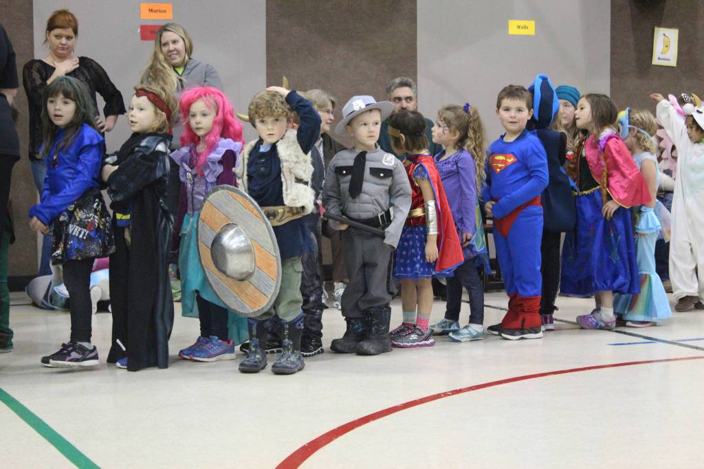 Students at Paul Banks Elementary School strut their stuff during the school&rsquo;s Halloween costume parade Tuesday, Oct. 31, 2017 at the school in Homer, Alaska. (Photo by Megan Pacer/Homer News)