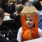 Fireweed student Madelyn Madrid chats in her pencil costume during lunch Tuesday, Oct. 31, 2017 at West Homer Elementary School in Homer, Alaska. Several area schools held costume parades and other celebrations for Halloween. (Photo by Megan Pacer/Homer News)