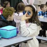 West Homer Elementary student Natalie Farren finishes lunch in her rabbit costume Tuesday, Oct. 31, 2017 at the school in Homer, Alaska. Schools across the lower peninsula had costume parades and other celebrations for Halloween. (Photo by Megan Pacer/Homer News)