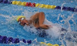 Homer&rsquo;s Alia Bales races the opening leg of the girls 200-yard freestyle relay Saturday, Nov. 4, 2017 at the ASAA First National Bank State Swimming & Diving Championships at the Bartlett High pool in Anchorage, Alaska. (Photo by Joey Klecka/Peninsula Clarion)