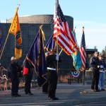 Veterans from several area outfits participate in a Veterans Day celebration Saturday, Nov. 11, 2017 in front of the Islands and Oceans Center in Homer, Alaska. (Photo by Megan Pacer/Homer News)