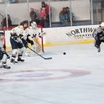 Homer&rsquo;s Charlie Menke, a senior, passes the puck during the Mariners&rsquo; game against Soldotna High School on Saturday, Nov. 18, 2017 at the Kevin Bell Arena in Homer, Alaska. The Mariners beat the Stars 10-3 and won the End of the Road Tournament. (Photo by Megan Pacer/Homer News)