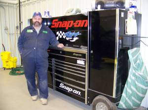 Brant &ldquo;Boog&rdquo; Torsen stands by a tool box in July 2009 when he opened his automotive repair shop on Kachemak Drive. (Homer News file photo)