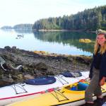WWOOFer Elizabeth Neil Lewis loading kayaks at A Seaside Adventure, Tutka Bay. (Photo by Jennifer Tarnacki)