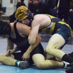 Homer&rsquo;s Chris Cudaback (right) wrestles with Frank Urbano of Colony in a 170-pound battle at the North-South tournament Saturday, Dec. 2, 2017 at Soldotna Prep School in Soldotna, Alaska. (Photo by Joey Klecka/Peninsula Clarion)